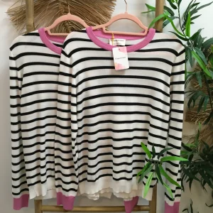 Jerser Blanco con rayas negras y rosa CF
