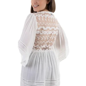 Blusa para embarazada con bordado al frente y transparencia en la espalda